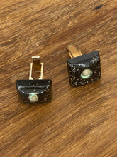 Load image into Gallery viewer, Black Bakelite and Resin Cufflinks with a Shell Decoration.
